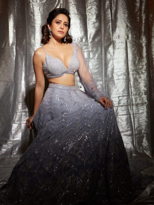 Nushrat balucha looks bold in this white Ethnic wear